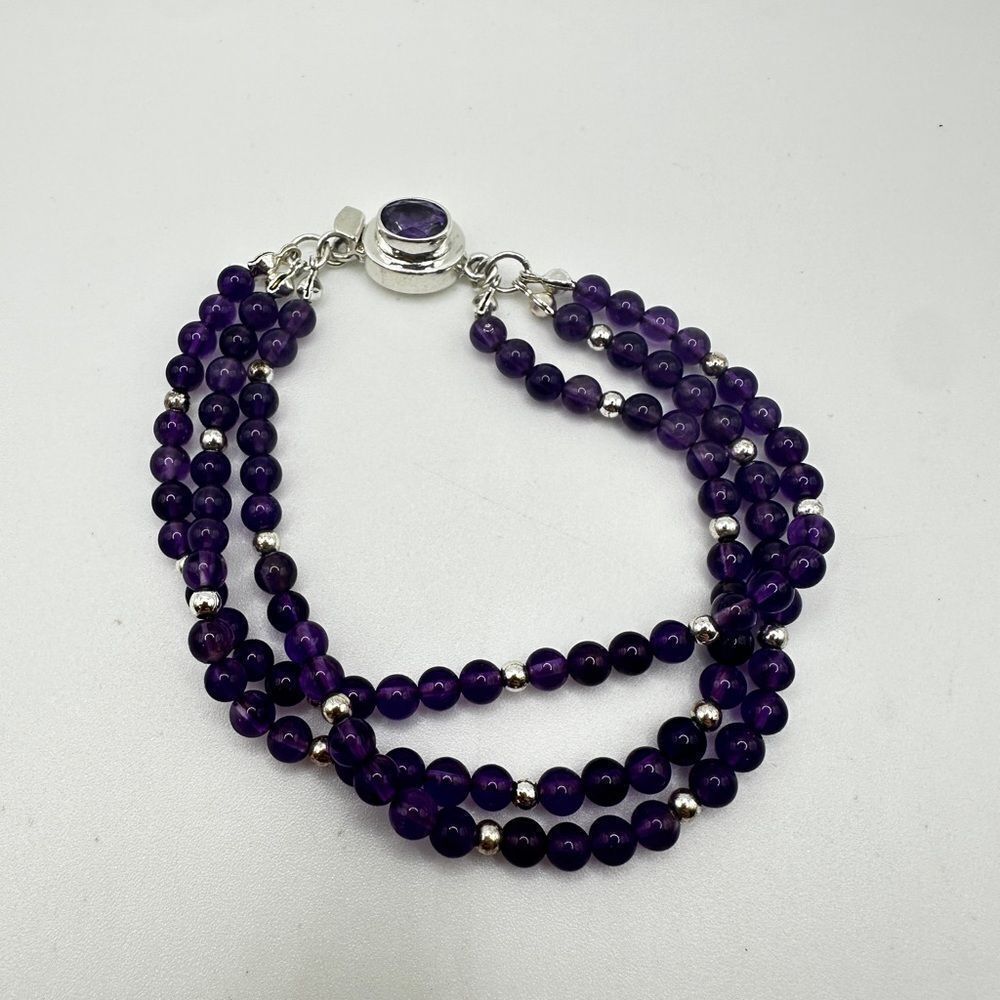 Stunning 3-stranded Amethyst and sterling silver bracelet with unique‎ clasp!